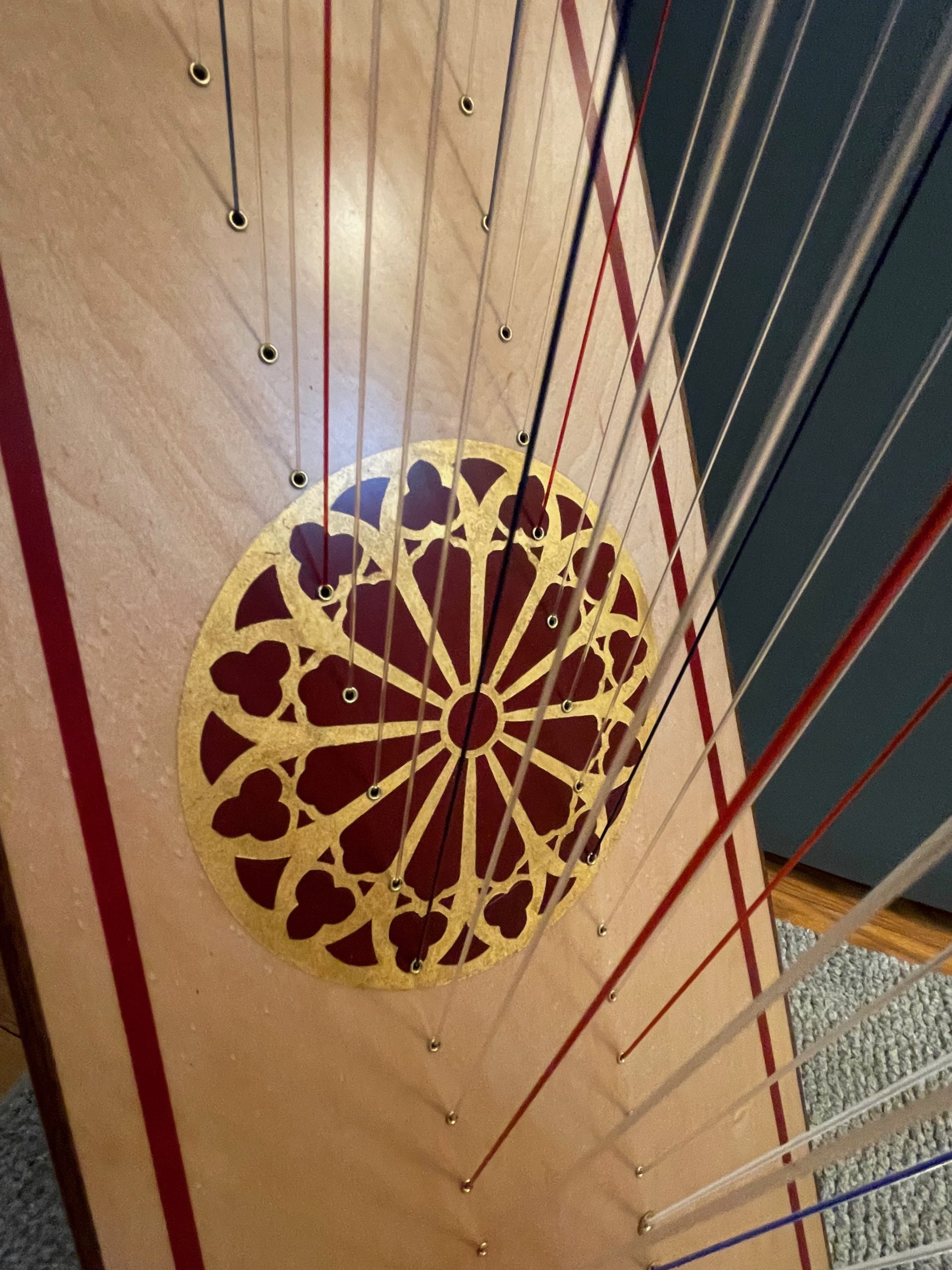 Rees Double Morgan Meghan double-strung harp closeup of soundboard ornamentation